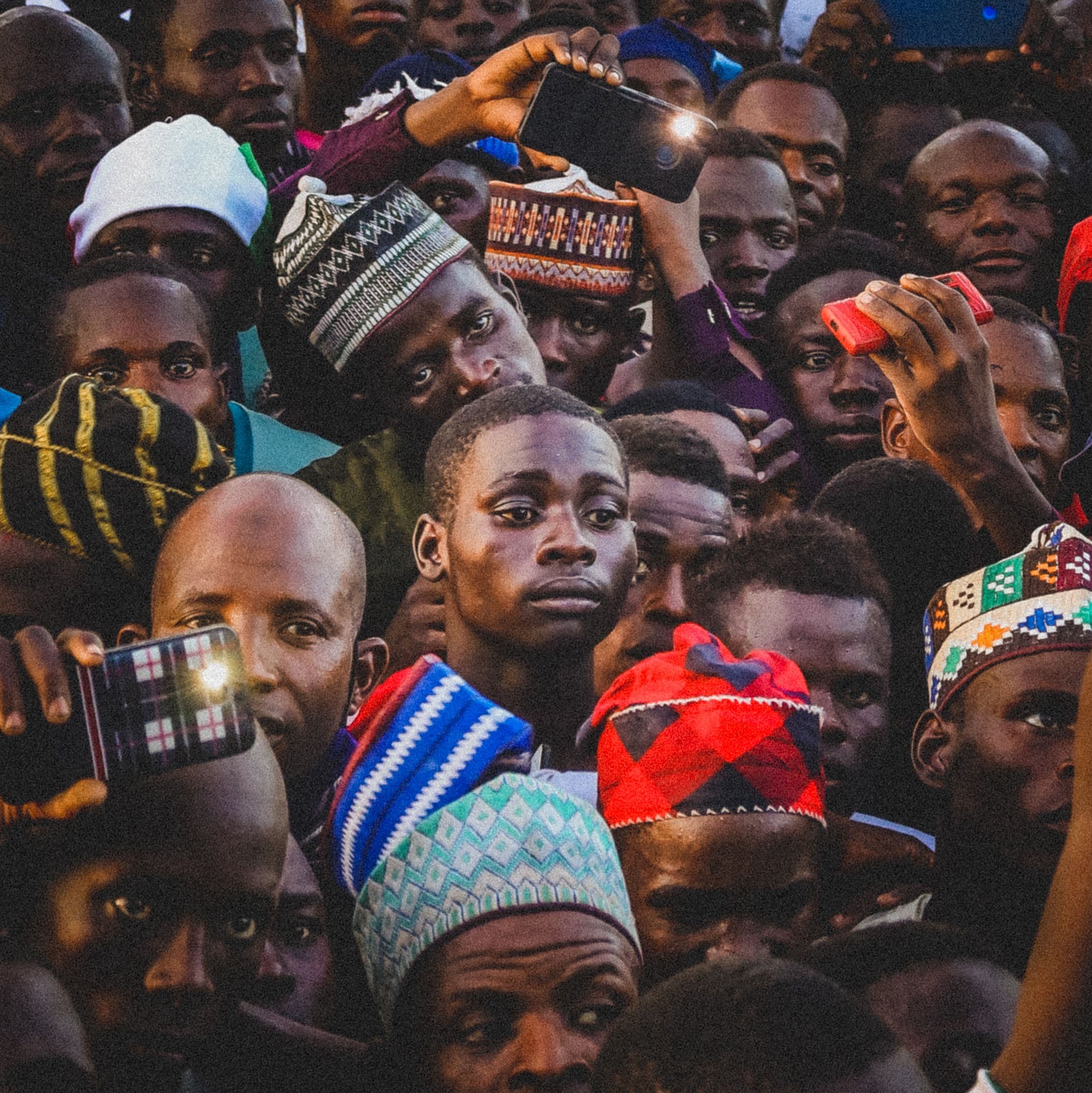 Audience using mobile phones to follow a live moment