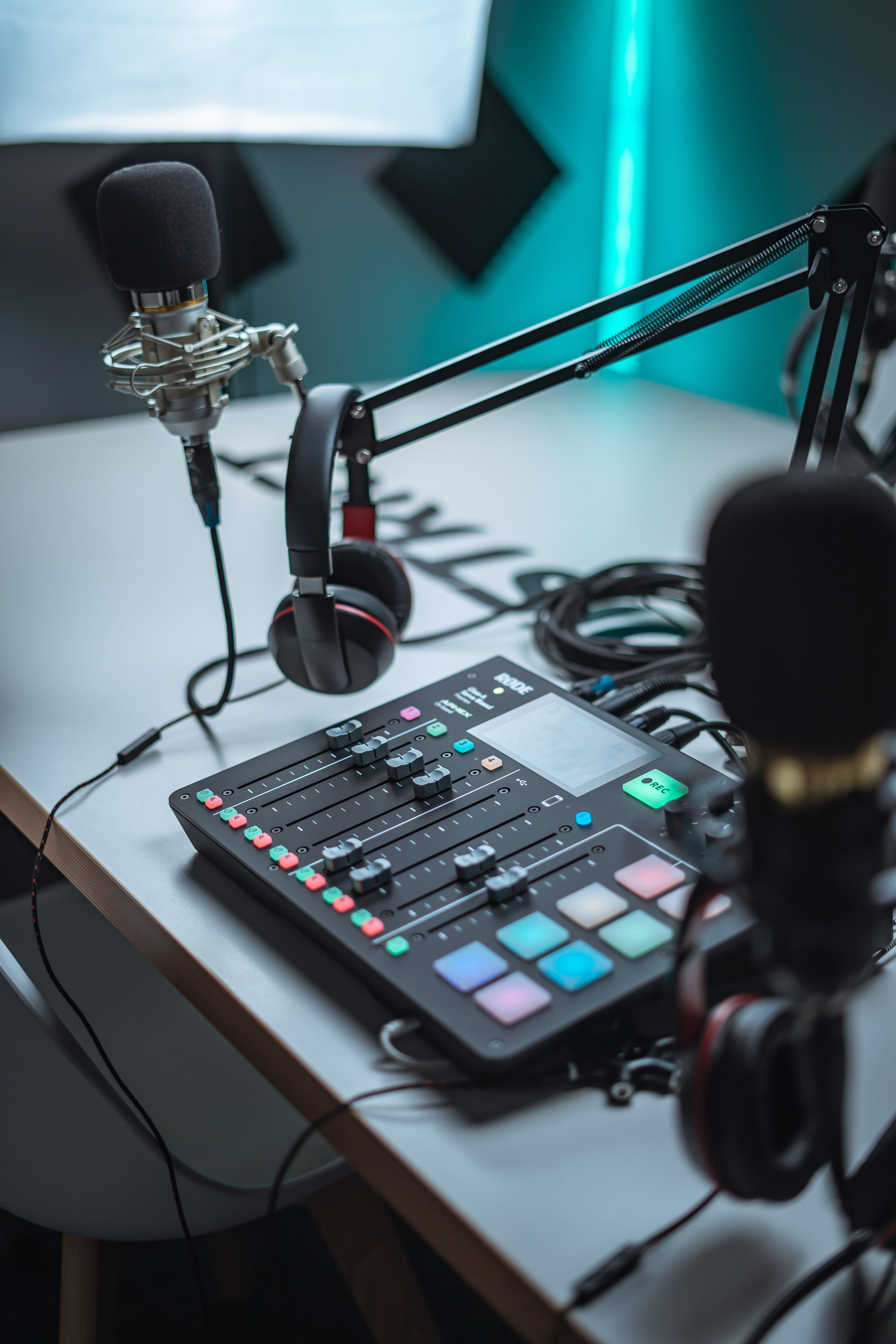 Radio production console with microphones and headphones